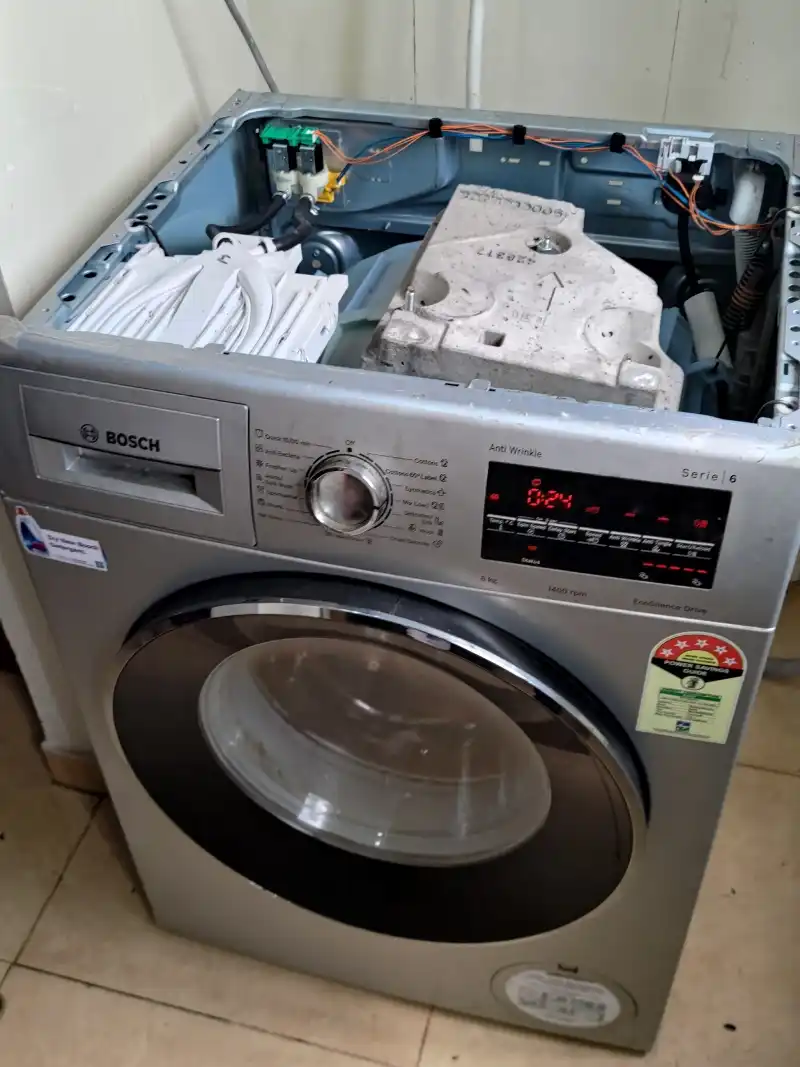 Front-load washing machine opened for inspection